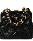 Patent Crumpled Lambskin Quilted Maxi Bow Clutch With Chain Black