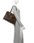 Reverse Monogram Giant Onthego MM