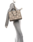 Empreinte Monogram Giant Onthego MM Tourterelle Creme