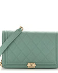 Caviar Quilted Boy Wallet On Chain WOC Light Blue