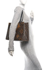 Reverse Monogram Giant Onthego MM