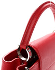 Taurillon Capucines PM Rubis