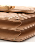 Caviar Quilted North South Boy Flap Beige