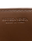 Lambskin Maxi Intrecciato Mini Cassette Crossbody Pouch Brown