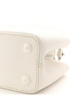 Taurillon Capucines East West MM Optic White
